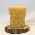 Bienenwachskerze mit Sonnenblumen