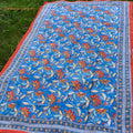 Blockdruck Tuch mit Blumen, kräftige Farben blau, rot, gelb. Größe 150 cm mal 200 cm