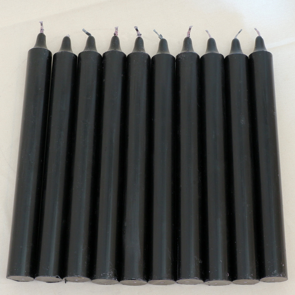 Schwarze Kerzen mit Patchouliduft 8 Stück