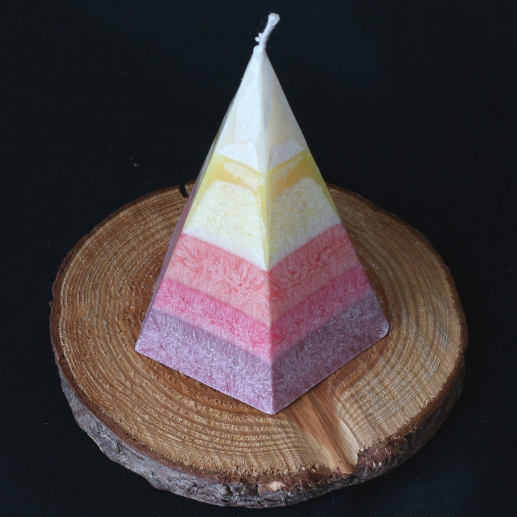 Sonnenzauber Duftkerze in Pyramidenform