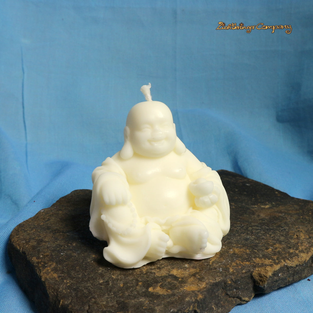 Glücksbuddha Kerze aus Rapswachs in Lila – handgefertigte Figurenkerze