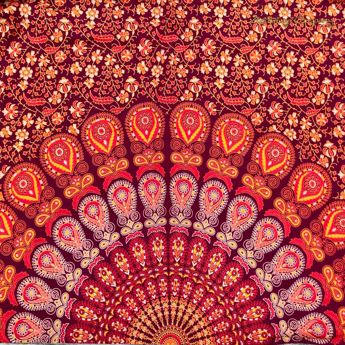 Orange rotes Pfauenfeder Mandala