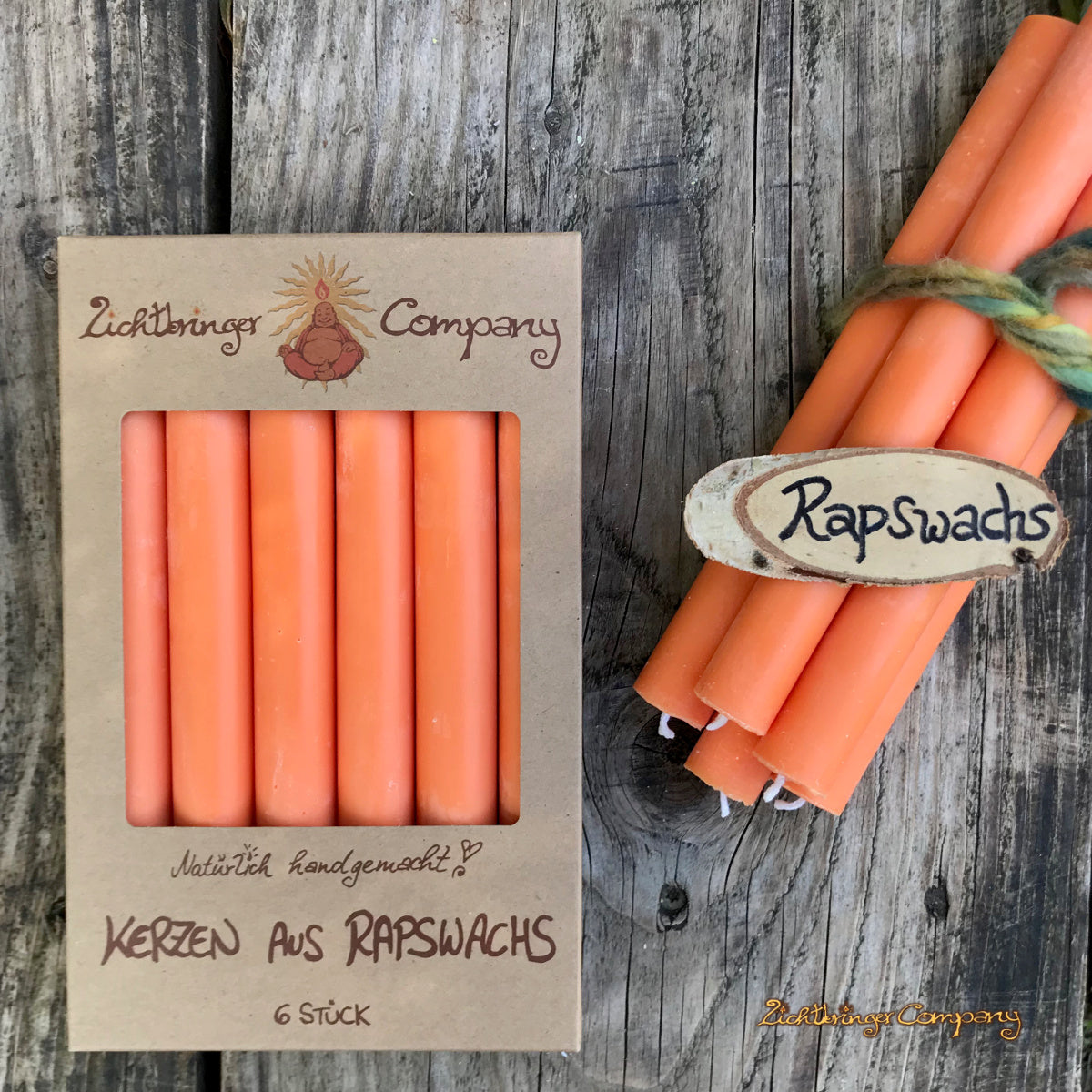 Rapswachs Stabkerzen in orange im Geschenkkarton