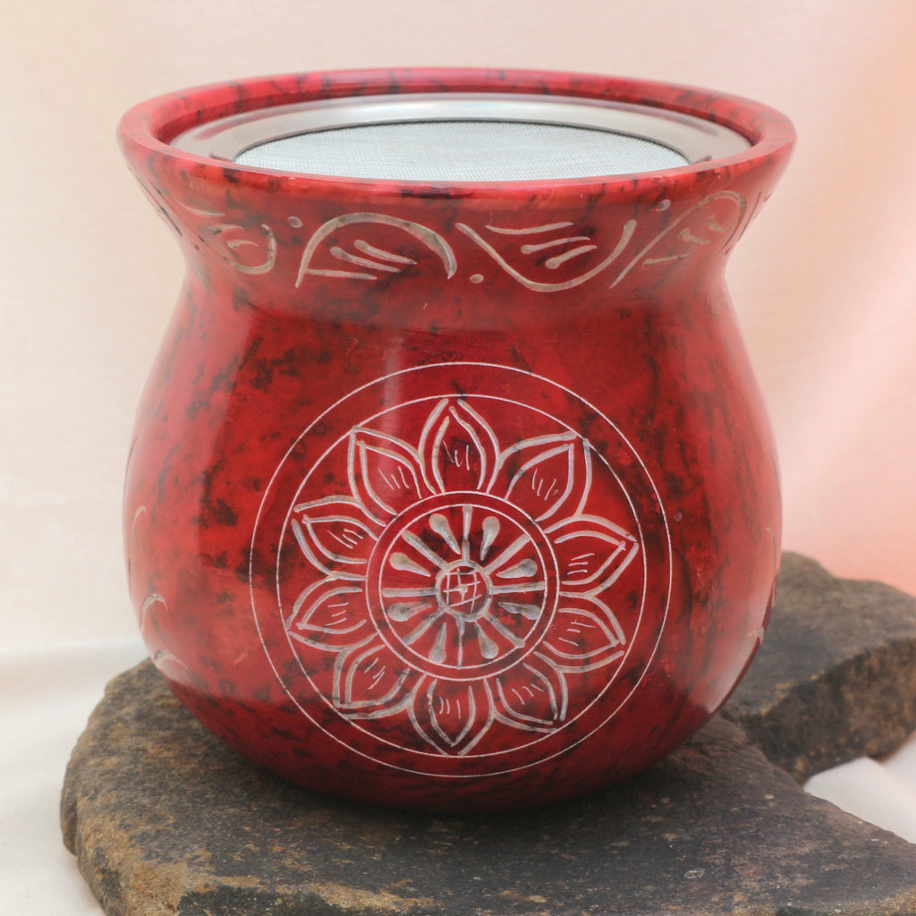 Rotes Räucherstövchen mit Sonnenblume